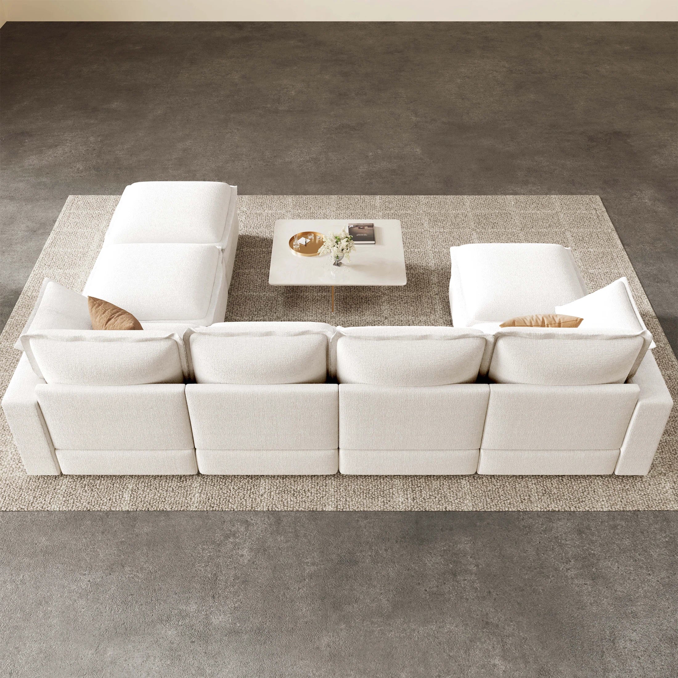 Rear top view of Densa 125" modular U-shaped cloud sofa in off-white chenille, featuring a spacious 7-seater layout with a modern coffee table