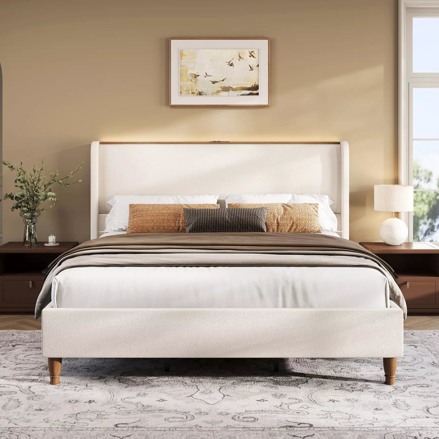 Neatly made bed with decorative pillows in a bedroom setting.