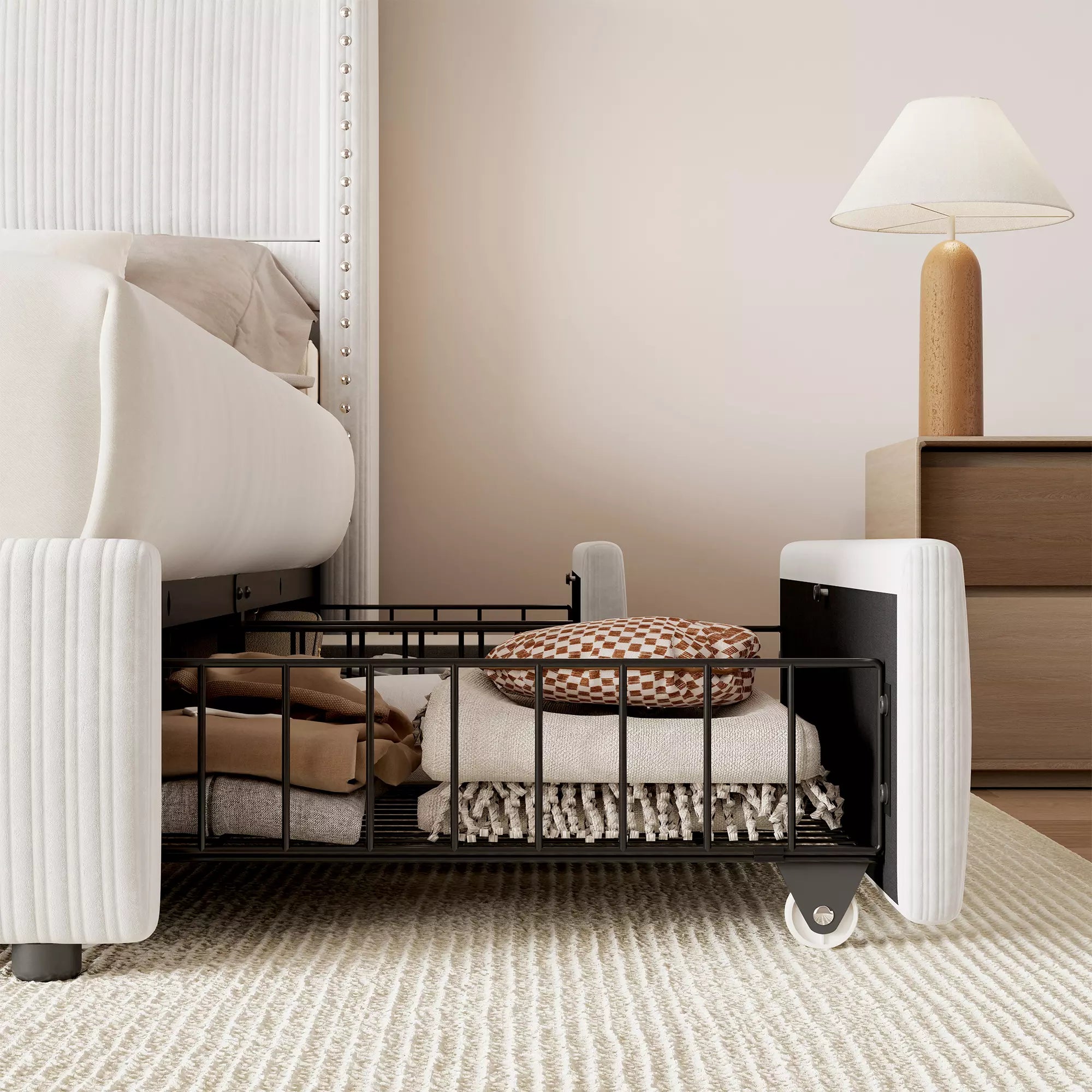 Detail view of Elysia storage drawer with smooth glide wheels and taupe white corduroy front panel.