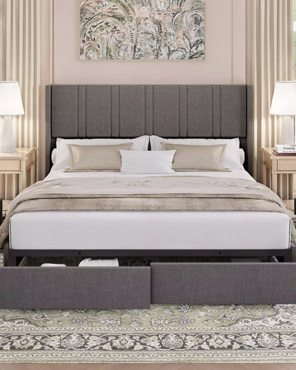 Gray upholstered bed with storage drawers in a bedroom setting.