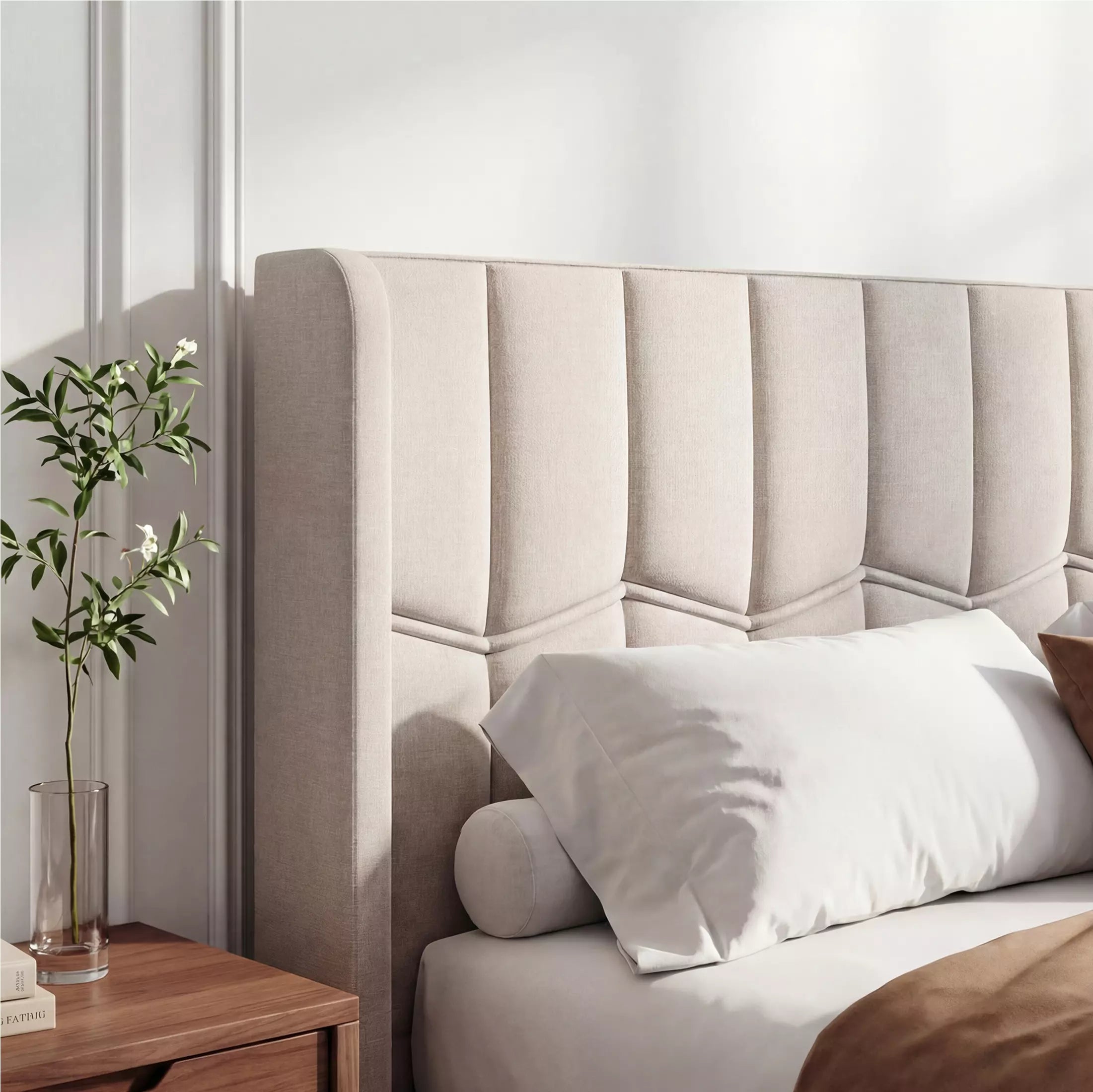 High-quality detail of Mara beige linen upholstery featuring elegant channel tufting and wave-line stitching.