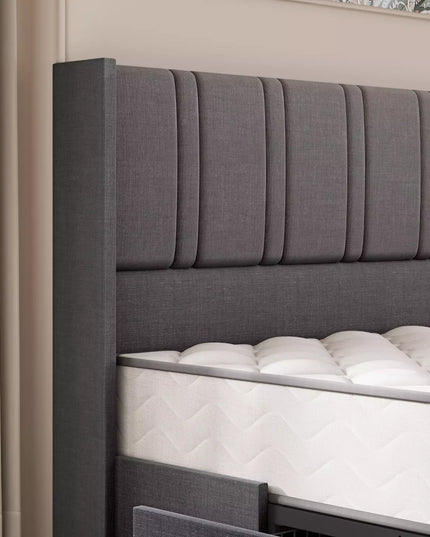 Gray upholstered headboard with white mattress in a bedroom setting