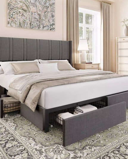 Gray upholstered bed with storage drawers in a bedroom setting.