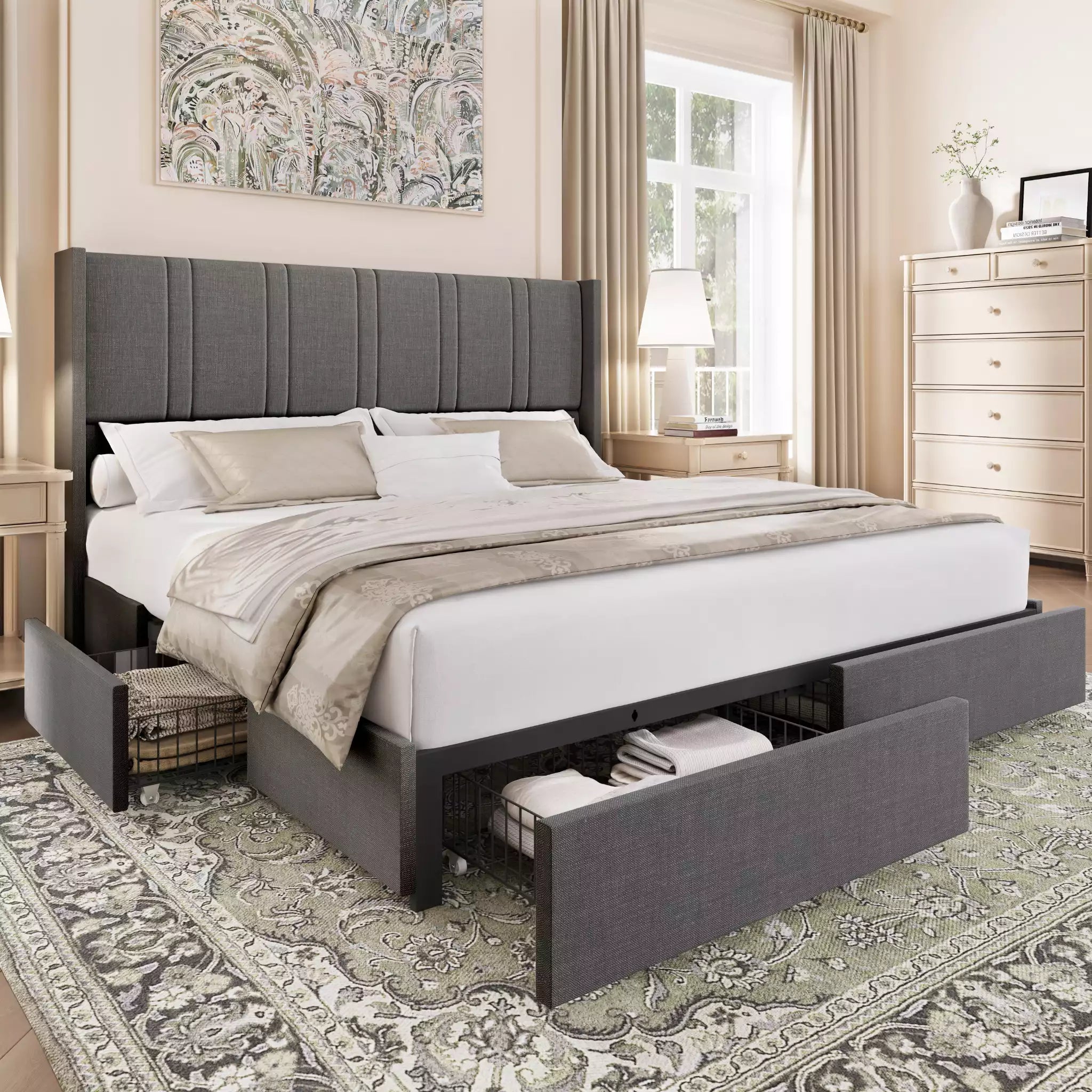 Gray upholstered bed with storage drawers in a bedroom setting.