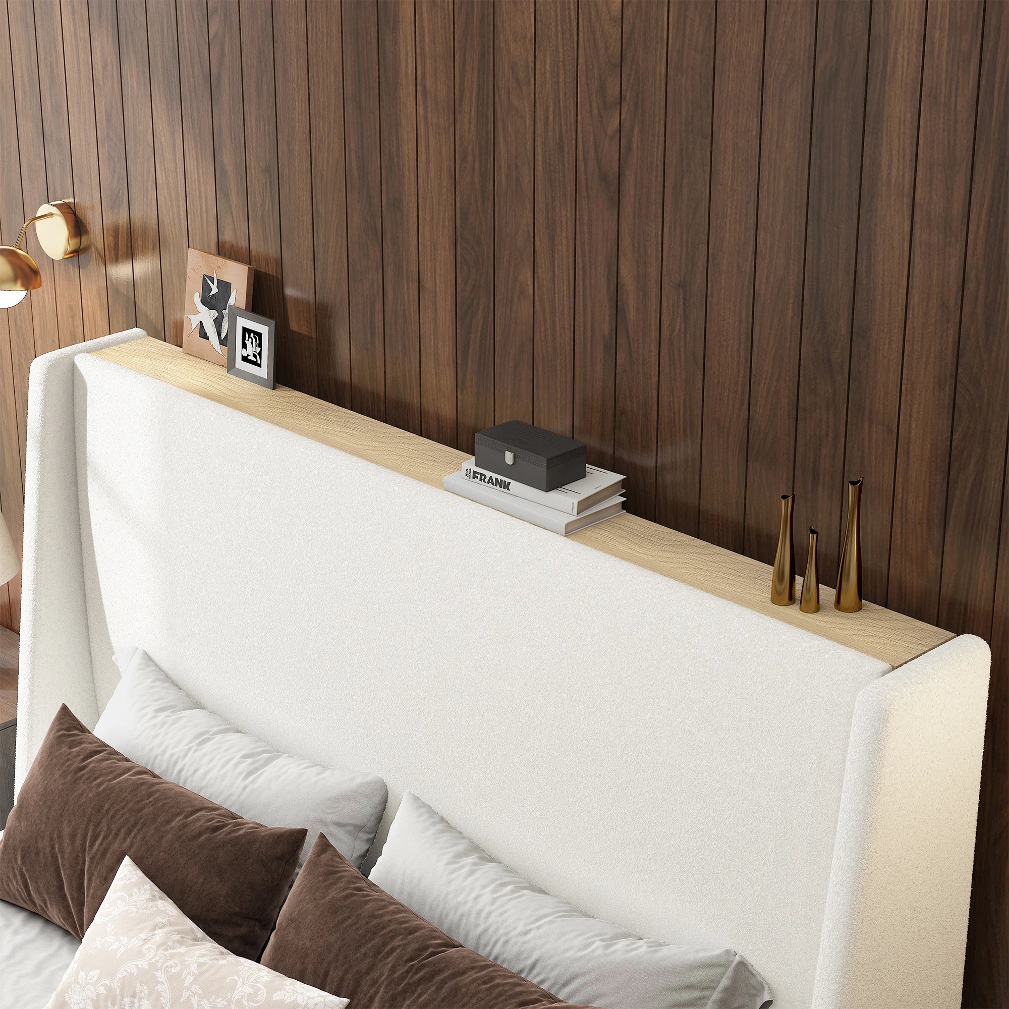 Close-up of white sherpa platform bed frame with built-in headboard top shelf