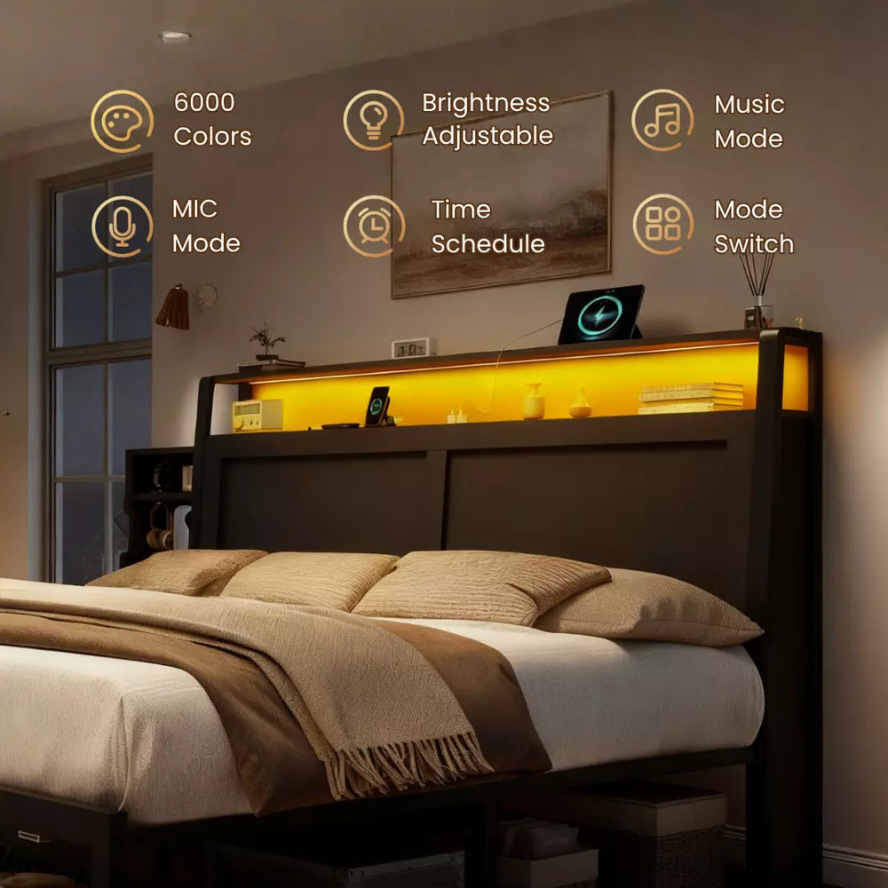 Bedroom setup with a headboard featuring various control icons and a laptop on top.