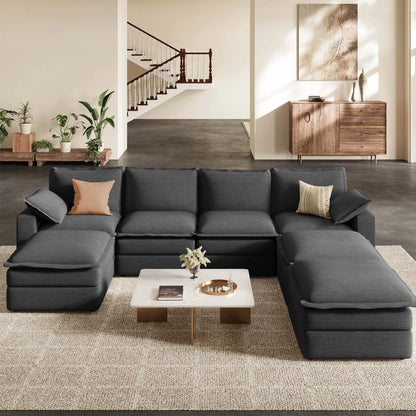 Densa 125" modular U-shaped cloud sofa in dark gray polyester, luxury 7-seater sectional in a modern living room setting.
