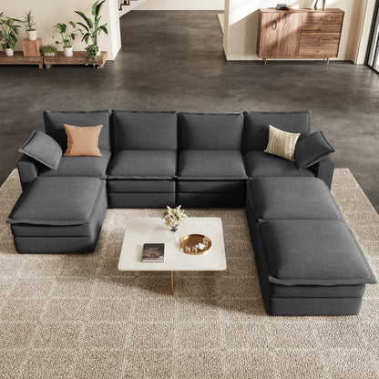 A spacious **7 seater u shape sectional sofa** in dark gray featuring **movable ottomans** for a flexible and comfortable modular living room layout