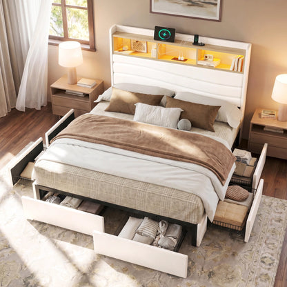 Top view of the Aura white upholstered storage platform bed frame with six rolling drawers open beneath the bed.