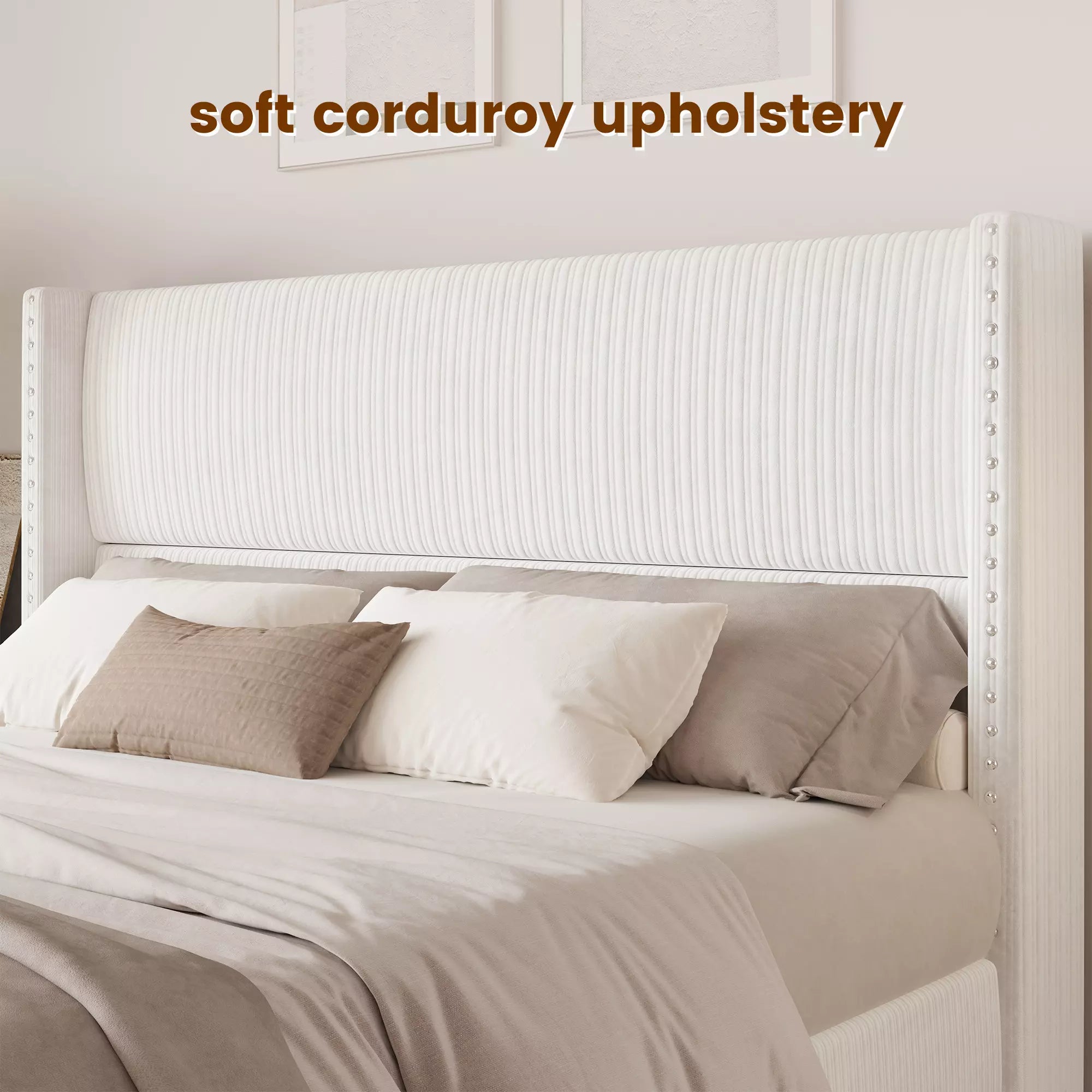 Close-up of Elysia soft white corduroy upholstery and silver nailhead trim on the tall wingback headboard.