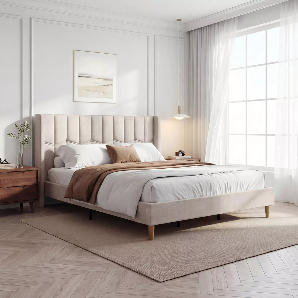 Side profile of the Mara modern classic wingback bed frame in beige fabric linen with minimalist design.