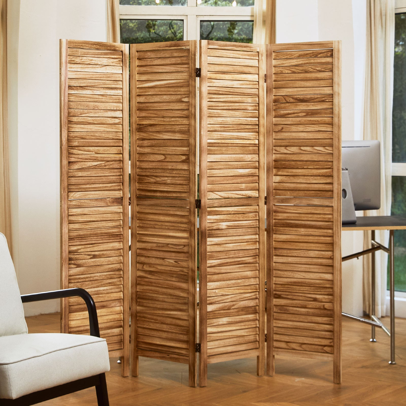 Light wood freestanding partition screen placed in a cozy boho style living room