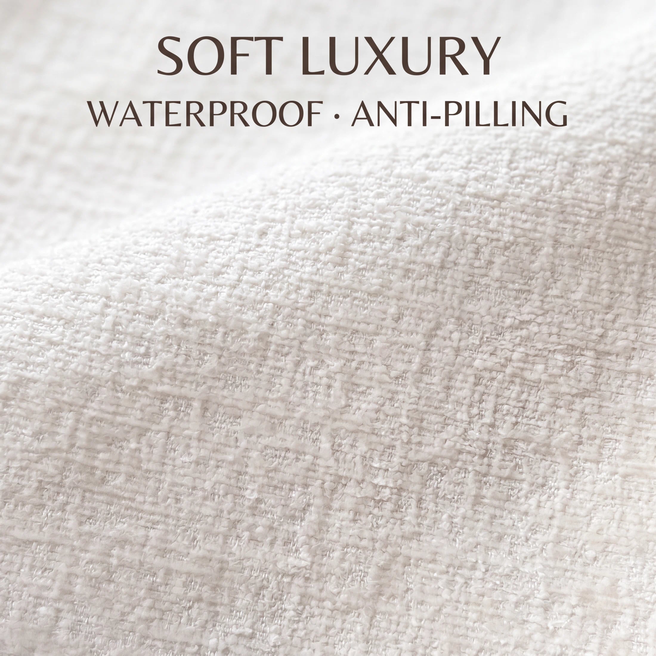Close-up of premium off-white chenille fabric, pill-resistant and soft-to-touch upholstery.