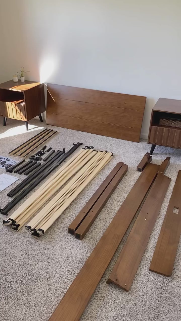 Load video: Assembly preview video showing Sorel Japandi solid wood platform bed frame parts, slats, support rails, and hardware before setup